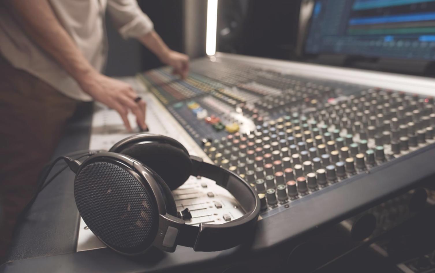 Program graduate working in newsroom